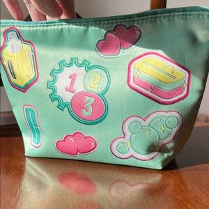 Clinique Mint Travel Pouch with Pink and Yellow Sticker Motifs